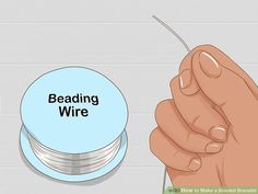 a stack of beading wire next to a button with the word beading wire on it