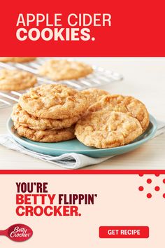 an advertisement for apple cider cookies on a blue plate with apples in the background