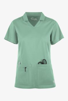 This UA Butter-soft Stretch women s 3-pocket short sleeve collar and knit panels scrub top features a modern fit with flattering woven collar set on v-neck. It has dyed-to-match knit panels that allow for ease of movement and comfort, as well as front and back darts for shape and fit. For storage, there are 3 pockets total; 2 roomy pockets with interior pen loops and 1 smaller items pocket. Id loop at wearers right shoulder. Fabric is made of cotton poly spandex. Limited heather colors are poly Lab Coat Fashion, Scrub Skirts, Koi Scrubs, Nursing Scrubs