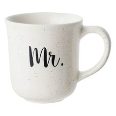 a white coffee mug with the word mr on it's side and black lettering