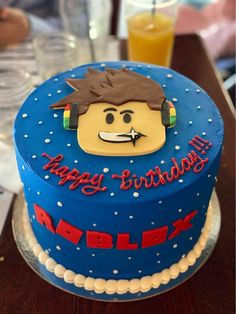 a birthday cake with a lego character on it