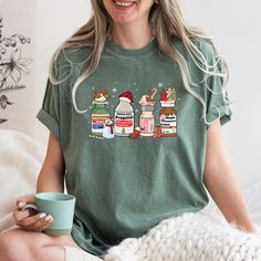 Comfort Colors® Nurse Christmas Shirt, Xmas Nurse Shirt, Christmas Nursing Shirt, Nurse Christmas Gift, Nurse Holiday Shirt, Xmas Gift  A Comfort Colors shirt is a type of casual t-shirt that is known for its softness, relaxed fit, and muted color palette. Typically made from 100% cotton, these shirts have a vintage feel and are often favored for their comfortable, worn-in look. This classic unisex jersey short sleeve and long sleeve tees fits like a well-loved favorite. Soft cotton and quality print make users fall in love with it over and over again. These t-shirts have-ribbed knit collars to bolster shaping. The shoulders have taping for better fit over time. Dual side seams hold the garment's shape for longer.  *6.1 oz./yd² (US), 10 oz/L yd (CA), 100% ring spun cotton, 30 singles *Garm Fun Christmas Shirts For Medical Clinic, Medical Office Christmas Shirts, Nursing Christmas Shirts, Christmas Short Sleeve Relaxed Fit Tops, Christmas Relaxed Fit Short Sleeve Tops, Relaxed Fit Short Sleeve Christmas Tops, Relaxed Fit Graphic Tee For Christmas, Relaxed Fit Christmas Holiday Tops, Nurse Christmas Shirts