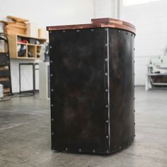 a large black box sitting on top of a cement floor