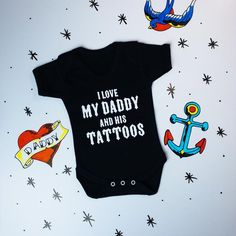 Anyone with kids knows that they love to look over their Daddys tattoos, that’s why this Metallimonsters’ exclusive vest top is the best way to show a softer side to your little monster, yet give a bit of much deserved appreciation to your ink!- 100% cotton unisex vest with 3 button fasteners, printed with 'I love my Daddy and his Tattoos' across chest.- Soft envelope neck opening.- Machine Washable. Maternity Hacks, Goth Baby, Rp Ideas, Neutral Baby Clothes, Cool Baby, Baby Announcements, Baby Tattoos, Dream Baby