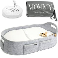 an image of a baby's bed and accessories