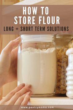 a person holding a jar with flour in it and the text how to store flour long + short term solution