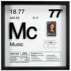 a clock with the words music and an image of a man's face on it