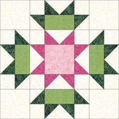 a pink, green and white quilted block with an arrow design on it's center