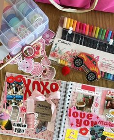 a table topped with lots of different types of crafts and supplies on top of it