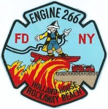 a patch with a man riding a surfboard on fire