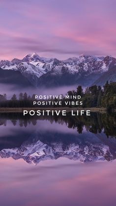 a lake with mountains in the background and text that reads positive mind positive vibes positive life