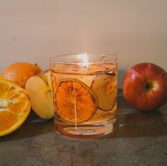 "Shalant gel candles - Handmade decorative gel candle made with real dried apples and oranges. scented with an orange-apple scent All our candles are reusable.  Once you have burned the gel center, you can replace it with one of our matching gel candle insert or just replace it with a wax tea light. Sizes available are: cup - 3.25\" diameter x 3.5\" h Med. Cube - 3.5\"w x 3.5\"w x 3.5\"h Lg. Cube - 4.5\"w x 4.5\"l x 4.5\"h #gel-candle, jelly candle, christmas candle, scented candle, gel wax candle, gelwax candle, holiday candle, holiday decor, candle gel, winter decor, fall candle, fall decor, citrus candle, reusable gel candle, hanukka candle, winter candle" Candle Gel, Jelly Candle, Jelly Candles, Apples And Oranges, Gel Wax Candles, Gel Candle, Apple Scent, Citrus Candle, Orange Apple