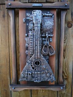 an art piece made out of metal and wood