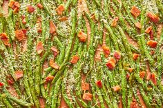 asparagus with bacon and parmesan cheese on top