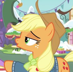 an animated pony with blonde hair and green eyes