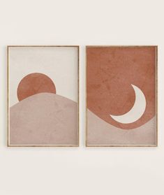 two framed art pieces on a wall with one showing the moon and half - moon