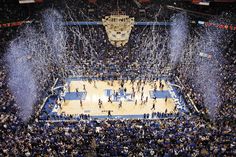 an overhead view of a basketball court with confetti thrown in the air