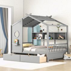 a child's bedroom with a bed, dresser and bookcase in the shape of a house