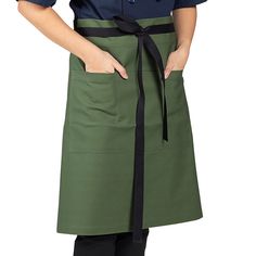 Take a step away from tradition with this Uncommon Chef 3118 sea green 100% cotton Mod waist apron with black webbing and 3 pockets. This waist apron is perfect for the ultra-cool bartender, waiter, or busboy, offering a trendy look at a great price. Extra-long 43" web ties ensure a one-size-fits-most fit, while reinforced bar tacking guarantees durability. A three-section pocket make it easy to store supplies such as guest checks, pens, straws, and receipts. At the same time, the waist styling Restaurant Aprons Uniform Ideas, Sushi Chef Uniform, Green Chef Apron, Professional Aprons Chefs, Cotton Workwear Apron With Pockets, Waiter Uniform, Restaurant Aprons, Green Apron, Restaurant Uniforms