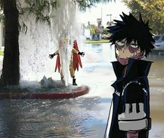 two anime characters standing in front of a fountain with water spouting from it