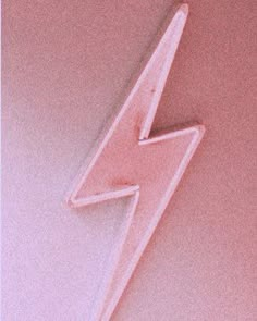 a pink neon sign with a lightning bolt on it