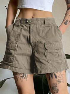 Style: Casual/Street/Hip Pop/Punk/Vintage/SweetFabric Content: Cotton. Polyester. SpandexFit Type: Regular fitDescription: Prepared some denim shorts for summer off-duty outfits. These cargo denim shorts for women are made from durable and comfortable cotton blend fabric. it has cargo-leg pockets patched. features chunky belt loops. and fastened with a button zip fly. SIZE WAIST (Inches) HIPS (Inches) Outseam (Inches) S 26.77 37.4 14.96 M 28.35 38.98 15.35 L 29.92 40.55 15.75 Sweatpants Street Style, Cargo Denim Shorts, Y2k Sweatpants, American Street Style, Chunky Belt, Off Duty Outfits, Summer Shorts Denim, Punk Vintage, Trendy Denim