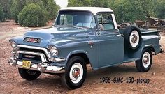 an old pick up truck is parked in the dirt