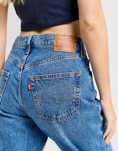 Go retro with these women's 501 '90s Jeans from Levi's. In a Dark Blue colourway, these straight-fit jeans are made from durable denim fabric without stretch. They feature a mid-rise waistband, a zip fly fastening and belt loops to the waist so you can adjust the fit. With a classic 5-pocket contruction, these jeans are finished up with the signature branded patch to the back, plus the iconic woven red label. Machine washable. | Our model is 5'7" and wears a size 26" Levis 501 Original, North Face Nuptse, 90s Jeans, Adidas Adilette, Label Machine, Adidas Originals Superstar, Nike Tech Fleece, Red Label, Nike Air Huarache