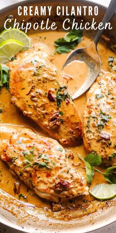 creamy cilantro chipotle chicken in a skillet with lime wedges