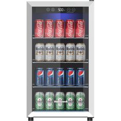 an image of a beverage cooler with six cans in it's glass door and two shelves