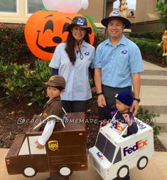 three people standing next to each other in front of a house with pumpkins on it