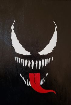 an image of a scary face painted on the side of a wall with white teeth and red tongue