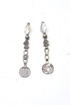 This beautiful Middle Eastern Silver Kuchi Earring/Pendants is a must-have for anyone who loves to accessorize with unique and meaningful pieces. Made of high-quality metal, this pendant/earring is designed in a stunning silver color that will match any outfit to perfection. The unisex adult design makes it suitable for everyone, and the free size ensures a comfortable fit. Crafted in Afghanistan, this piece is full of history and tradition. Its intricate design reflects the Middle Eastern cultu Middle Eastern Culture, Pendant Earring, Overland Park, Middle Eastern, Pendant Earrings, Unisex Design, Pendant Necklaces, Silver Color, Jewelry Necklace Pendant