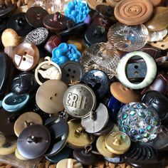 a pile of buttons sitting next to each other