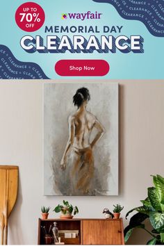 an advertisement for the memorial day clearance is displayed in front of a painting on a wall