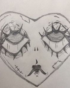 a drawing of a heart with eyes drawn on it