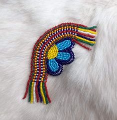 the beaded headdress has been made with beads and other colors on it