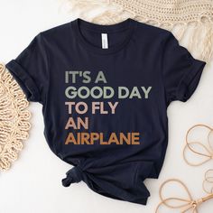 It's a Good Day to Fly an Airplane Shirt - Fun tee designed for pilots and pilots in training. Hoping for a SWEATSHIRT? Wish I had a different COLOR or SIZE? Please ask! I will do my best to accommodate! About Our Shirts These are premium, super soft, non-fitted unisex tees. Fits like a well-loved favorite. .: 100% Airlume combed and ringspun cotton (Heather colors are 52% airlume combed and ringspun cotton, 48% polyester) (Athletic Heather is 90% ringspun cotton & 10% polyester) .: Light fabric Airplane Shirt, Student Pilot, Female Pilot, It's A Good Day, Shirt Female, Miami Fl