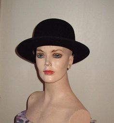 Black Felt Ladies Fedora to wear with a Business Suit for the Lady Executive. A great Stylish Hat to add pizazz to an outfit. 4 1/2" crown  2 1/2" brim .   In excellent condition, like New!   Made by "Bollman" in the USA.  Head size 21 21/2" Insurance included in shipping Black Formal Boater Hat With Flat Brim, Formal Black Boater Hat With Flat Brim, Classic Fedora Costume Hat For Winter, Vintage Black Wide Brim Costume Hat, Classic Party Hat With Flat Brim, Classic Formal Mini Hats With Wide Brim, Black Mini Hat With Flat Brim For Formal Occasions, Classic Wide Brim Mini Hat For Formal Occasions, Formal Black Mini Hat With Flat Brim