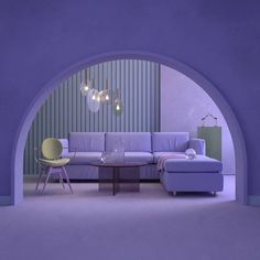 a living room with purple walls and furniture