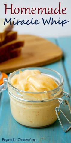 homemade mince whip in a glass jar on a blue table with bread and butter