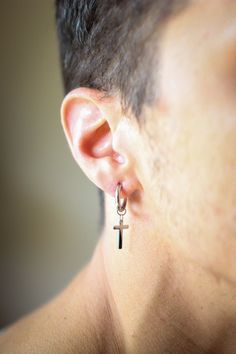 Cross Dangle Earring (1 Earring) Includes: 1 Earring (Sold as a Single)Size:: 18gFinish: Silver or BlackMaterial: Zinc AlloyStyle: DangleClosure: Huggie Black Skull Ring, Dangle Cross Earrings, Black Earrings Men, Earring For Men, Cross Earring, Mens Skull Rings, Popular Earrings, Earrings Aesthetic, Trendy Earrings