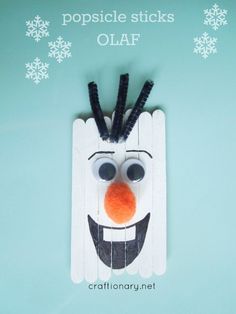 popsicle sticks are made to look like a frozen snowman with horns and nose