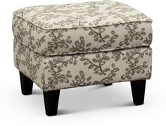 a foot stool with a flower pattern on it