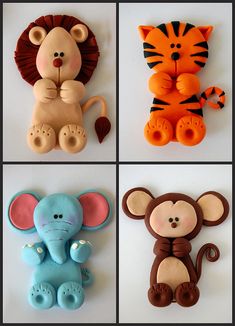 four different types of stuffed animals are shown in this photo, including an elephant, tiger, and giraffe