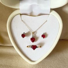 This Is A Heart-Shaped Jewelry Set. This Set Includes A Pair Of Beautiful Ruby Red Earrings, A Gorgeous Ruby Red Heart-Shaped Necklace On A Gold Chain And A 10k Gold Ring Topped With A Heart-Shaped Ruby With Diamonds. Ruby Jewelry Necklaces Gold, Ruby Heart Ring, Ruby Jewelry Necklaces, Birthday Looks, Gold Jewelry Set, Ruby Heart, 10k Gold Ring, Life Of Luxury, Diamond Heart Ring