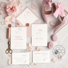 the wedding stationery is laid out and ready to be put into the bride's shoes