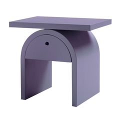 a small purple table with an oval design on the top and one drawer at the bottom