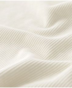 the texture of an unmade bed sheet is shown in this close up photo,