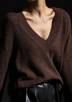 Color: Brown Lightweight wool blend fabric Regular fit Deep v neck Drop shoulders Rib knit trim Slip on style Unlined 35% Polyamide 30% Wool 25% Alpaca 10% Acrylic Dry Clean Imported Chic Cashmere V-neck Sweater For Winter, Classic V-neck Fall Sweater, Trendy V-neck Sweater For Fall Workwear, Chic Wool V-neck Fine Knit Sweater, Trendy V-neck Sweater For Work, Chic V-neck Fine Knit Sweater, Brown Cashmere V-neck Sweater, Cozy Wool V-neck Sweater For Work, V-neck Tops For Winter Workwear